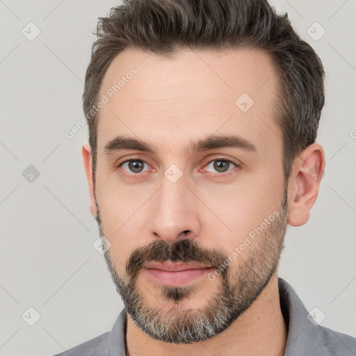 Neutral white young-adult male with short  brown hair and brown eyes