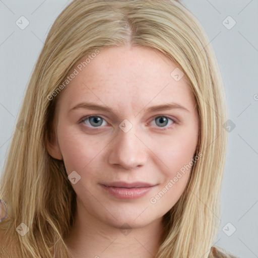 Joyful white young-adult female with long  brown hair and blue eyes