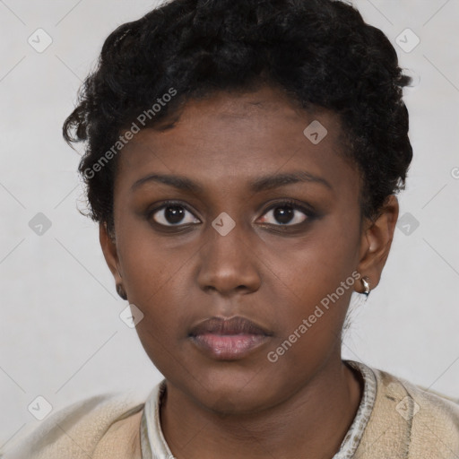 Neutral black young-adult female with short  brown hair and brown eyes