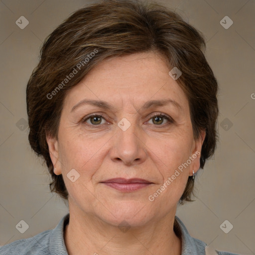 Joyful white adult female with medium  brown hair and grey eyes