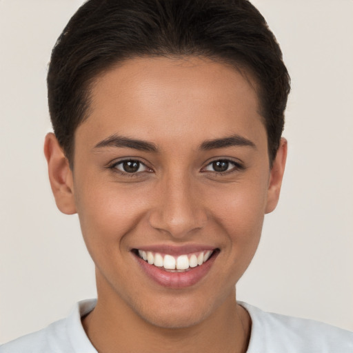 Joyful white young-adult female with short  brown hair and brown eyes