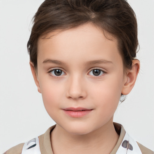 Neutral white child female with short  brown hair and brown eyes