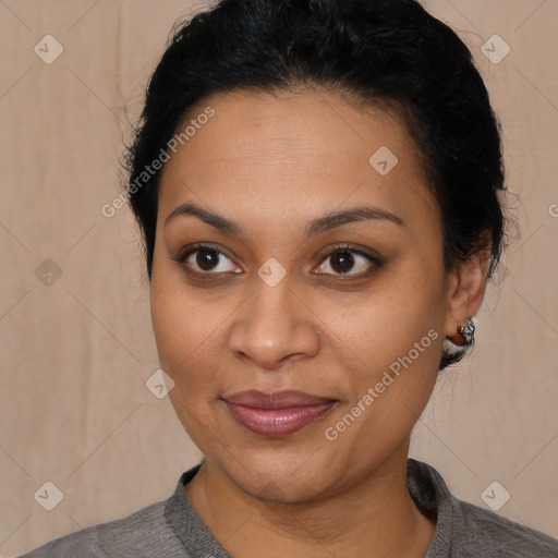 Joyful latino young-adult female with short  brown hair and brown eyes