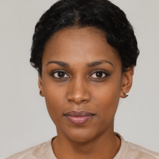 Neutral black young-adult female with short  black hair and brown eyes