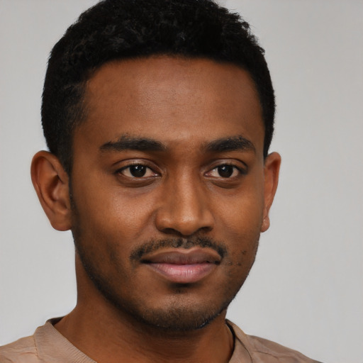 Neutral black young-adult male with short  black hair and brown eyes