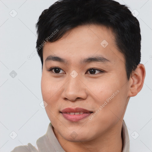 Joyful asian young-adult male with short  black hair and brown eyes