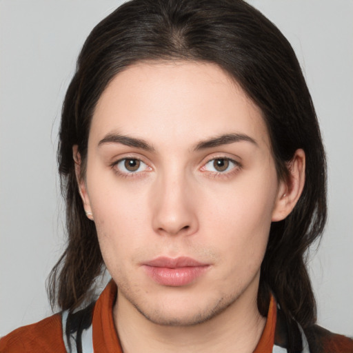 Neutral white young-adult female with medium  brown hair and brown eyes