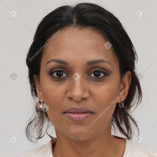 Joyful black young-adult female with medium  brown hair and brown eyes