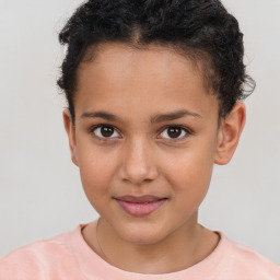 Joyful white child female with short  brown hair and brown eyes