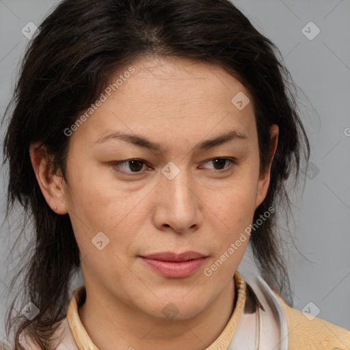 Joyful white adult female with medium  brown hair and brown eyes