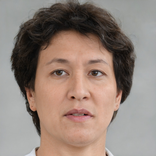 Neutral white adult female with short  brown hair and brown eyes