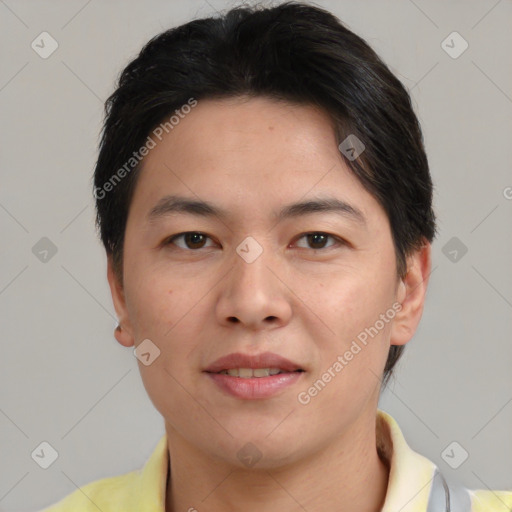 Joyful asian young-adult male with short  brown hair and brown eyes