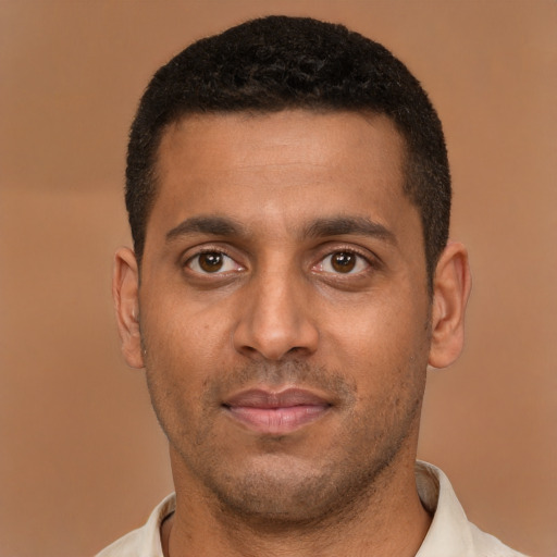 Neutral black young-adult male with short  brown hair and brown eyes
