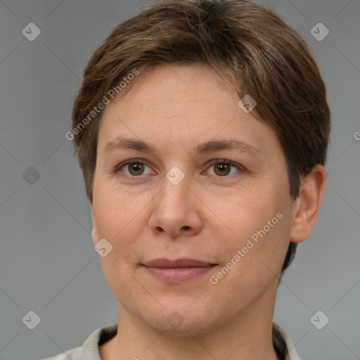 Joyful white adult female with short  brown hair and brown eyes