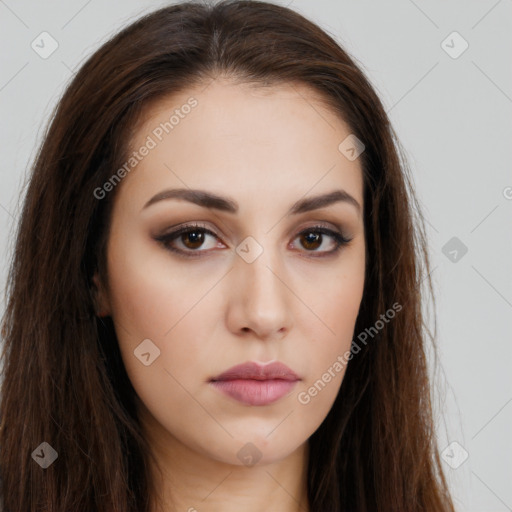 Neutral white young-adult female with long  brown hair and brown eyes