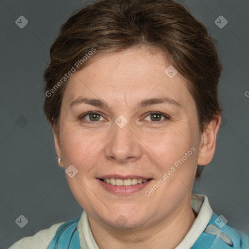 Joyful white adult female with short  brown hair and brown eyes