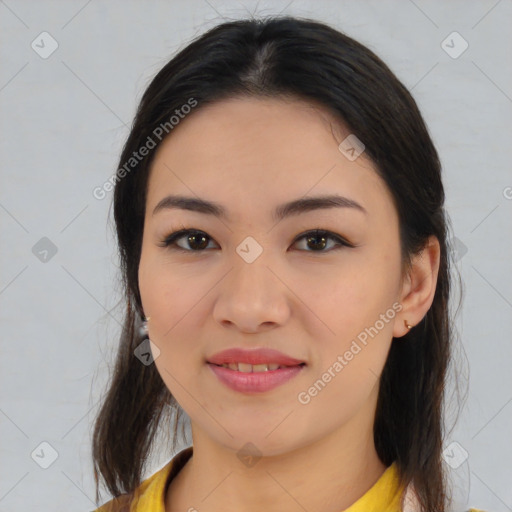 Joyful asian young-adult female with medium  brown hair and brown eyes