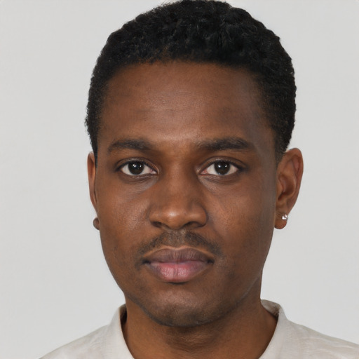 Neutral black young-adult male with short  black hair and brown eyes