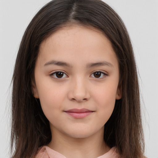Joyful white child female with long  brown hair and brown eyes