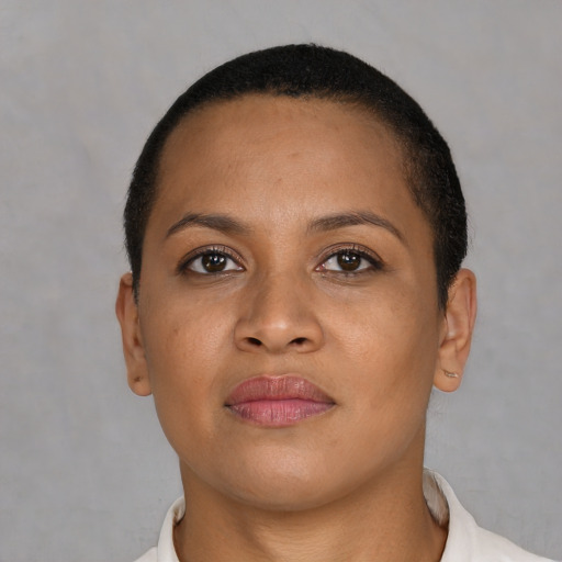 Neutral latino young-adult female with short  brown hair and brown eyes