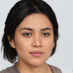 Neutral asian young-adult female with medium  brown hair and brown eyes