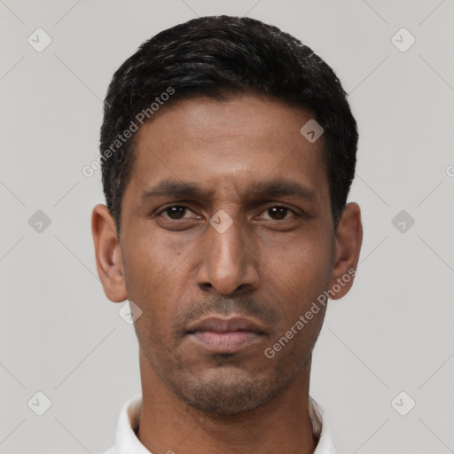 Neutral latino young-adult male with short  black hair and brown eyes