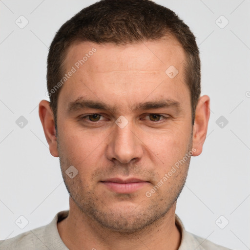 Neutral white young-adult male with short  brown hair and brown eyes