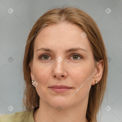 Joyful white adult female with medium  brown hair and brown eyes