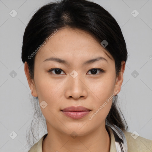 Joyful asian young-adult female with medium  brown hair and brown eyes