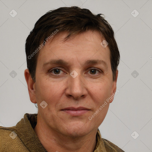 Joyful white adult male with short  brown hair and grey eyes