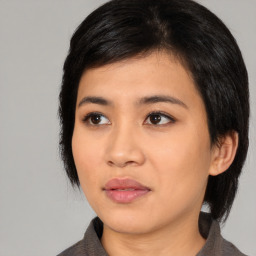 Neutral asian young-adult female with medium  black hair and brown eyes