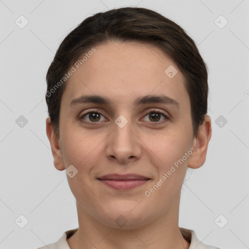 Joyful white young-adult female with short  brown hair and brown eyes