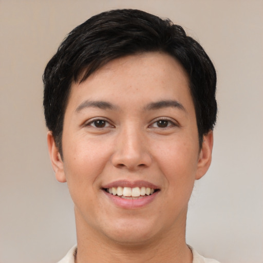 Joyful white young-adult female with short  black hair and brown eyes