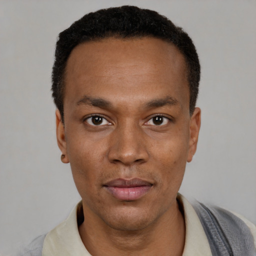 Neutral black young-adult male with short  black hair and brown eyes