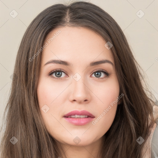 Neutral white young-adult female with long  brown hair and brown eyes