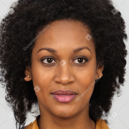 Joyful black young-adult female with long  brown hair and brown eyes