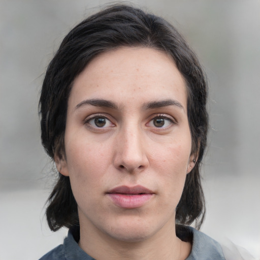 Neutral white young-adult female with medium  brown hair and grey eyes