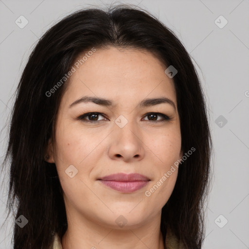 Joyful asian young-adult female with long  brown hair and brown eyes