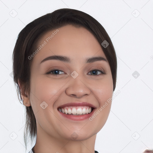 Joyful white young-adult female with medium  black hair and brown eyes