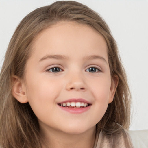 Joyful white child female with long  brown hair and brown eyes