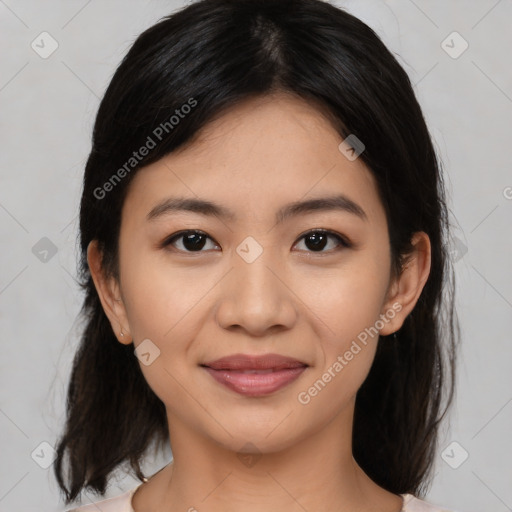 Joyful latino young-adult female with medium  black hair and brown eyes