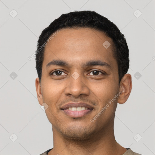 Joyful latino young-adult male with short  black hair and brown eyes