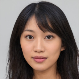 Neutral asian young-adult female with long  brown hair and brown eyes