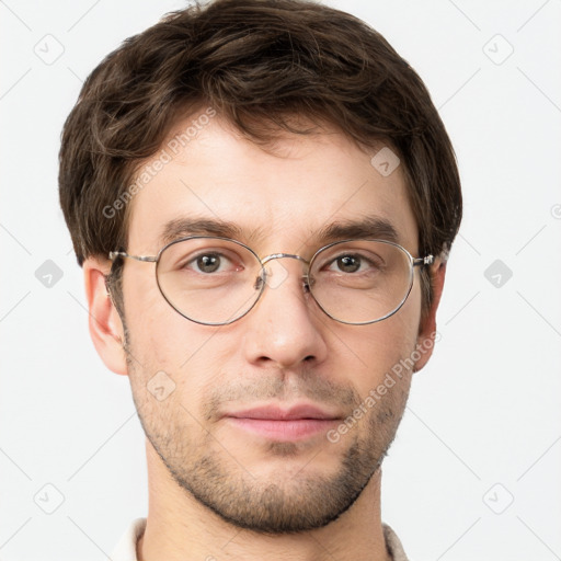 Neutral white young-adult male with short  brown hair and grey eyes