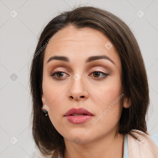 Neutral white young-adult female with medium  brown hair and brown eyes