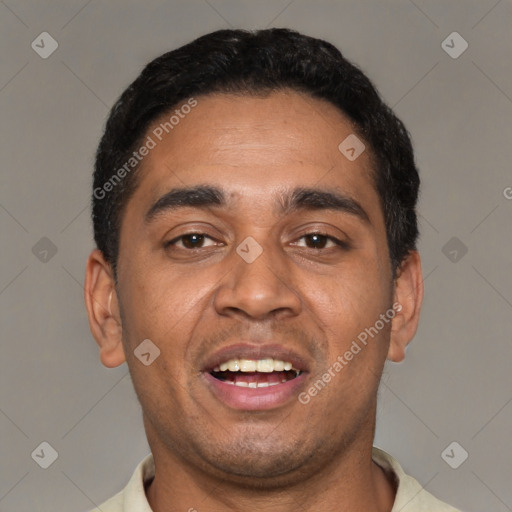 Joyful black young-adult male with short  black hair and brown eyes