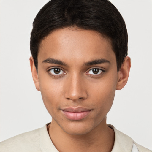 Joyful black young-adult male with short  brown hair and brown eyes