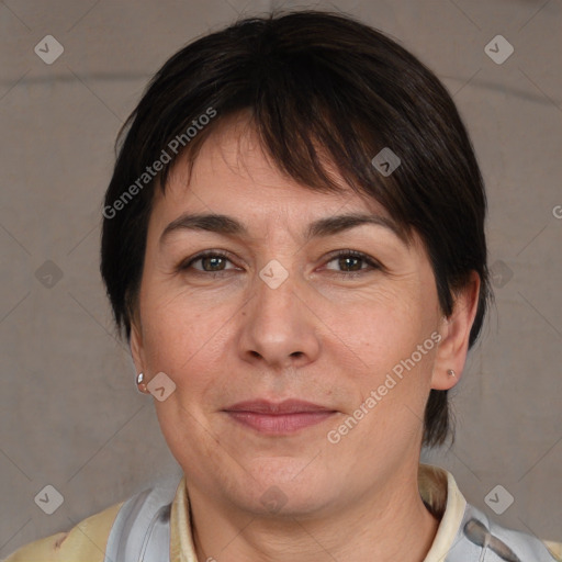 Joyful white adult female with medium  brown hair and brown eyes