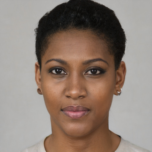 Neutral black young-adult female with short  brown hair and brown eyes