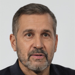 Neutral white middle-aged male with short  brown hair and brown eyes